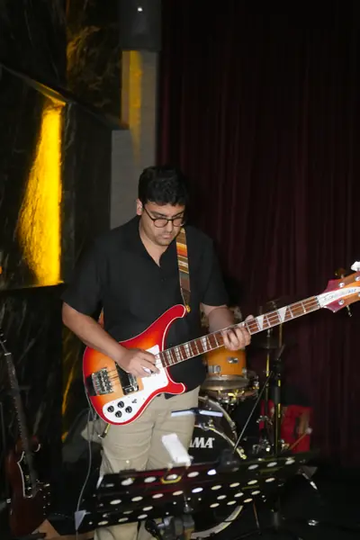 Arjun on bass