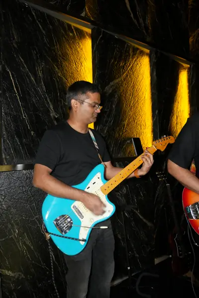 Chaitanya on guitar
